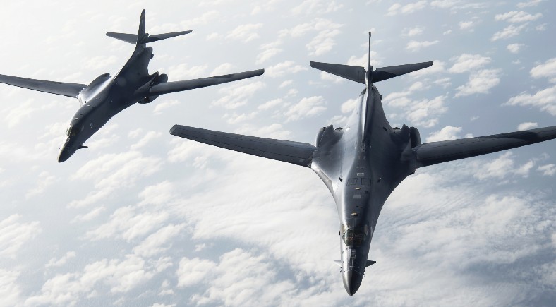Two B-1B Lancers assigned to Ellsworth Air Force Base, South Dakota, fly in formation above Gulf of Mexico, February 7, 2021 (U.S. Air Force/ Ryan C. Grossklag)